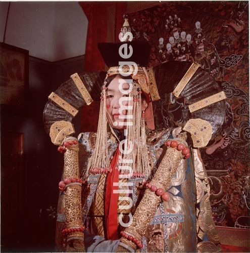 Mongolian woman dressed in the bridal costume of the Great Khans