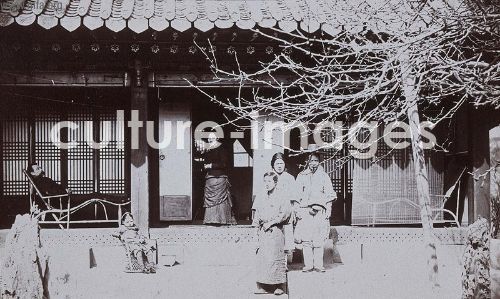 Foreign teacher with his Japanese wife and Eurasian children with servants in their home, formally a temple (NRICP Relic No.: 2868)