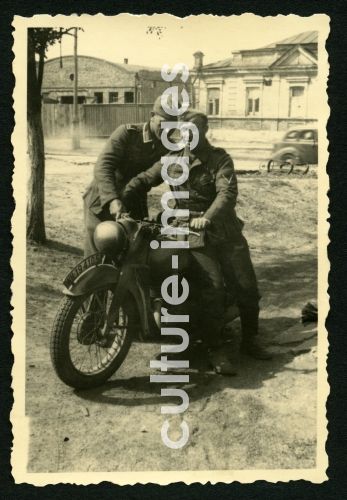 German Wehrmacht soldiers with motorbike in Kharkiv German Wehrmacht soldiers with motorbike in Kharkiv